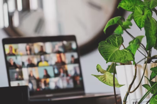 A picture with a laptop on a meeting