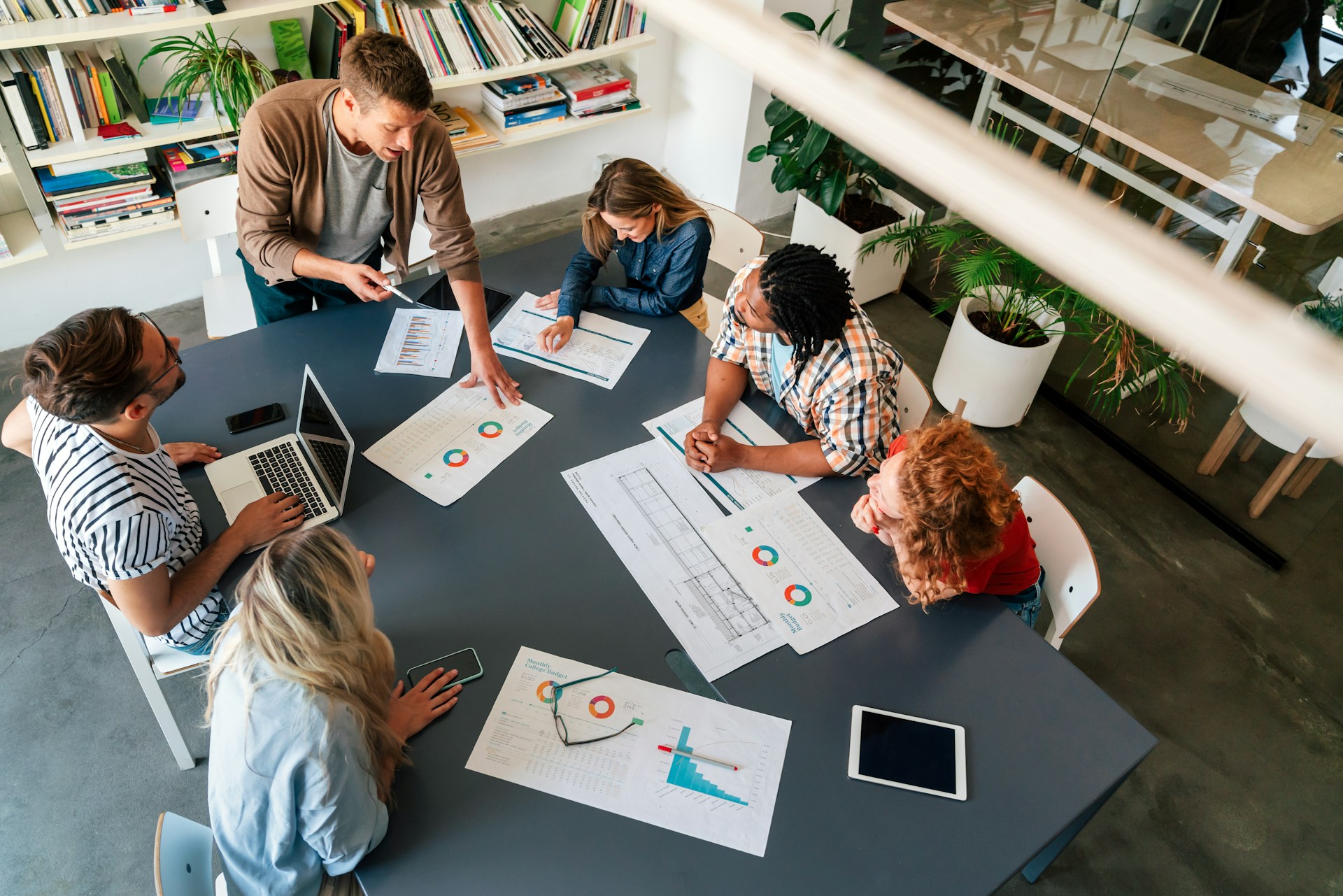 Group of people working office tasks