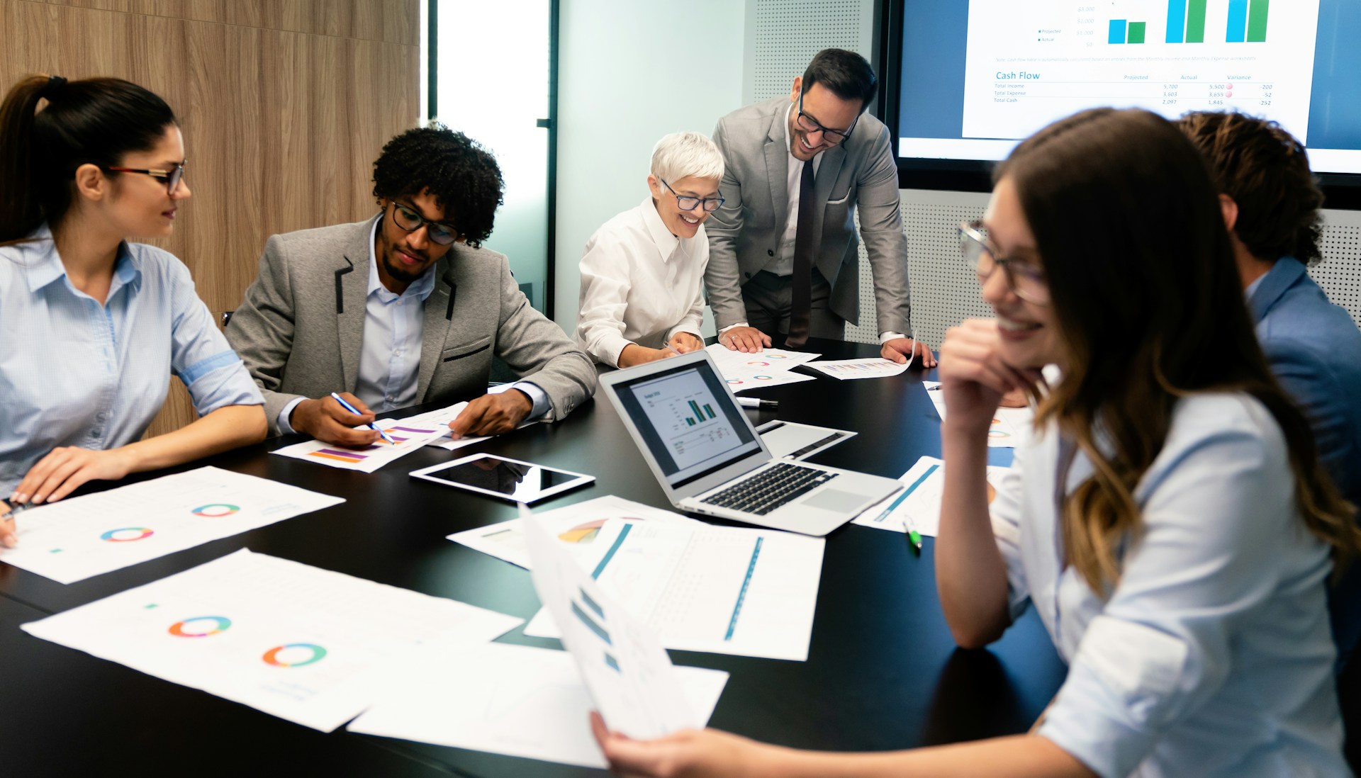 Group of employees talking to each other