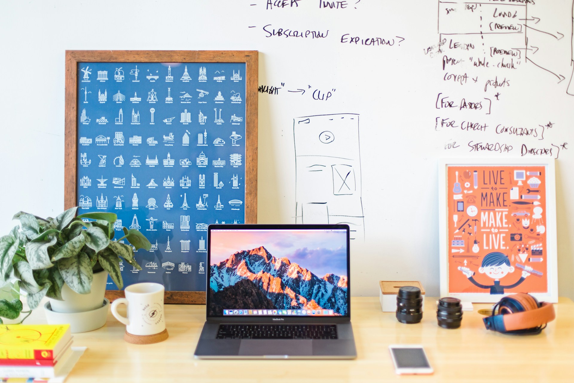 Macbook on a brown wooden table