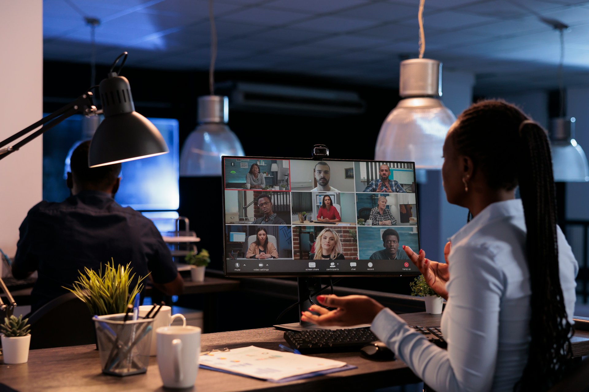 A person talking to a remote meeting