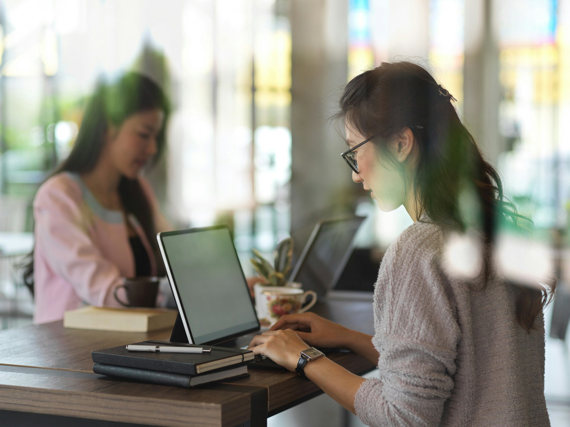A woman checking on her laptop