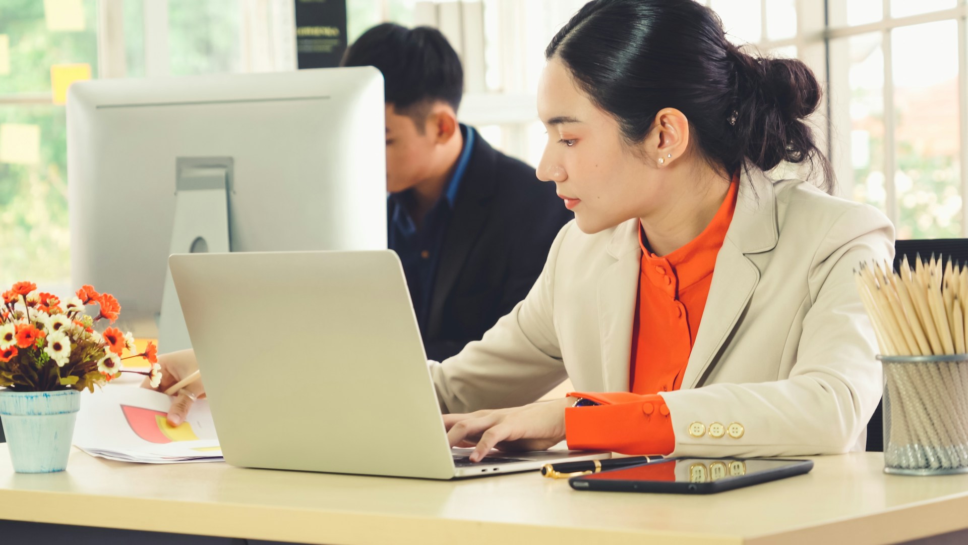A woman using a laptop