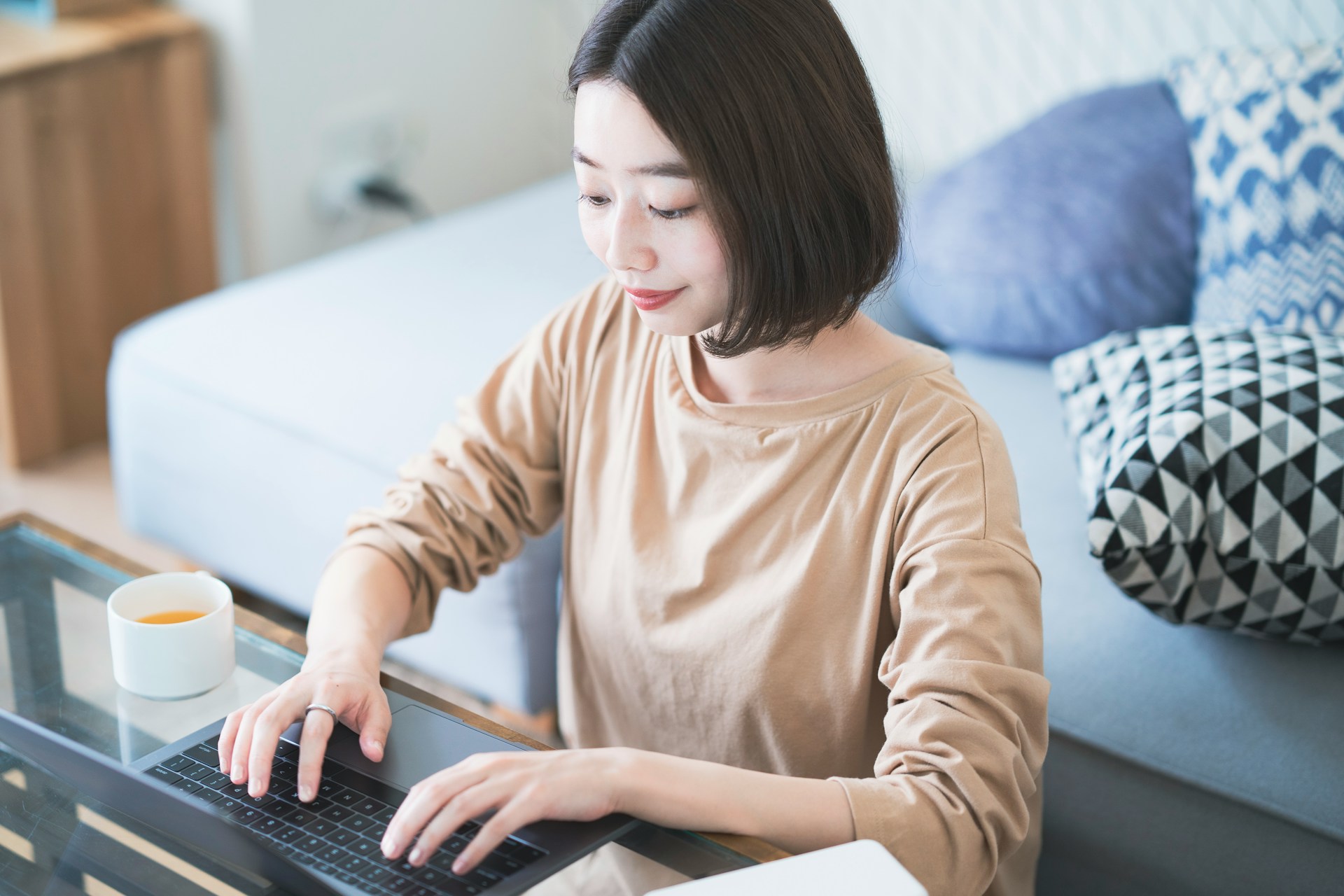 A woman using a laptop